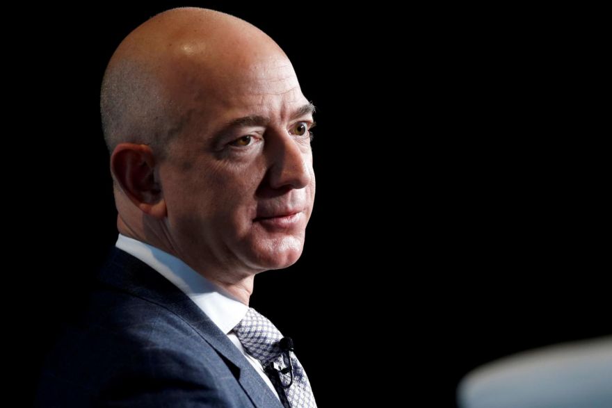 Amazons Jeff Bezos accuses National Enquirer owner of 
